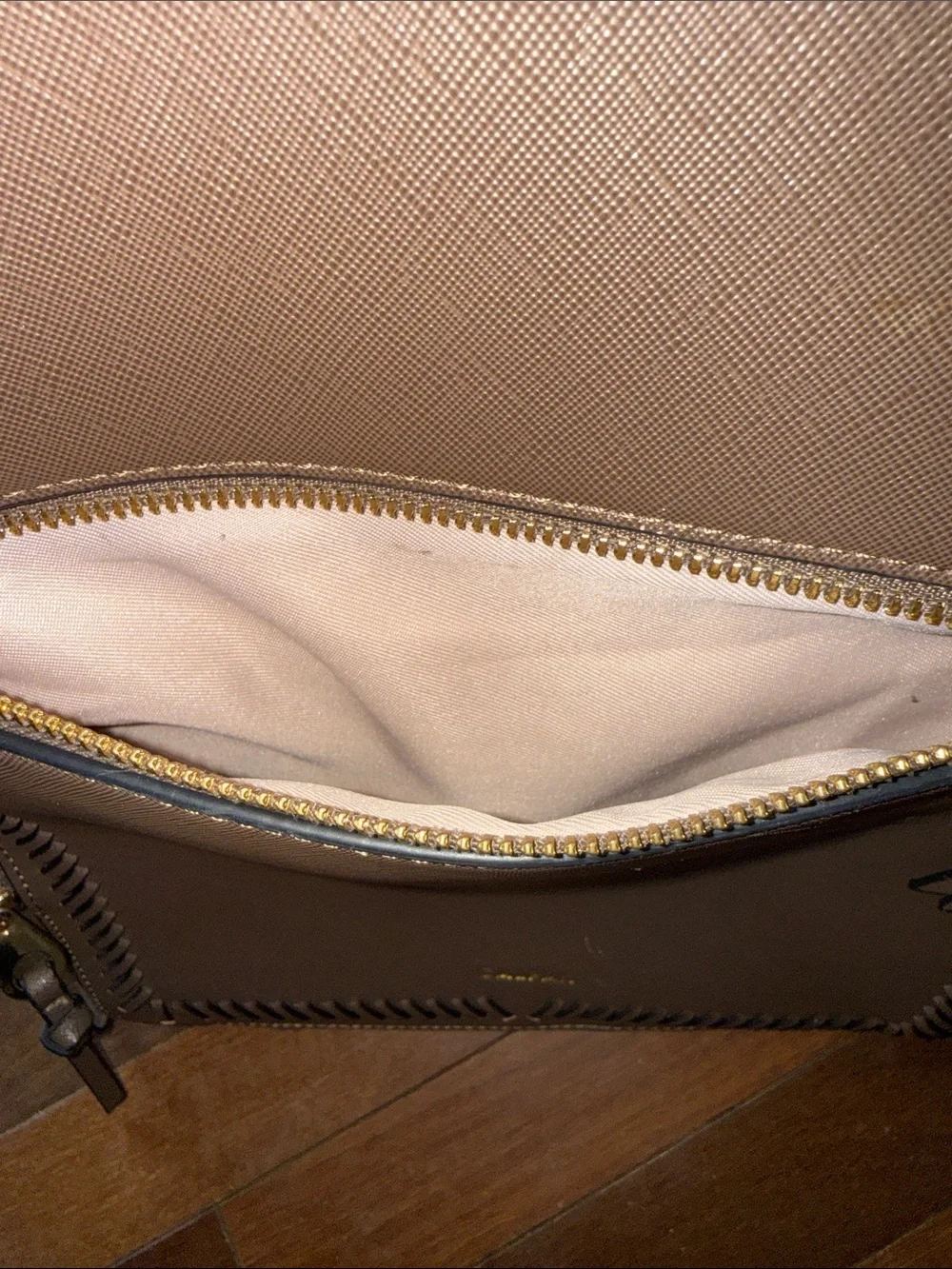 Calpak Brown Leather Backpack with Whipstitch Trim and Gold Hardware